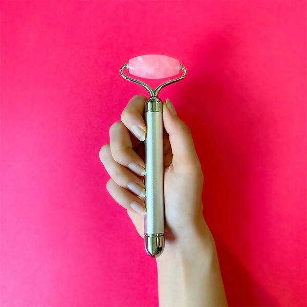 Buy Natural Vibes Rose Quartz Vibrating Face Massage Roller with Free Gold Beauty Elixir Oil from DrMediCart, Ship from India to USA